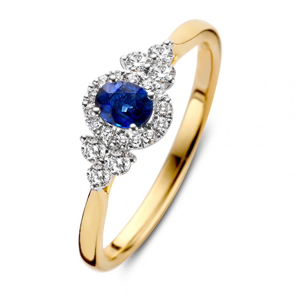 Anillo de dama bicolor de 14 quilates con zafiro azul y engaste vintage de diamantes.