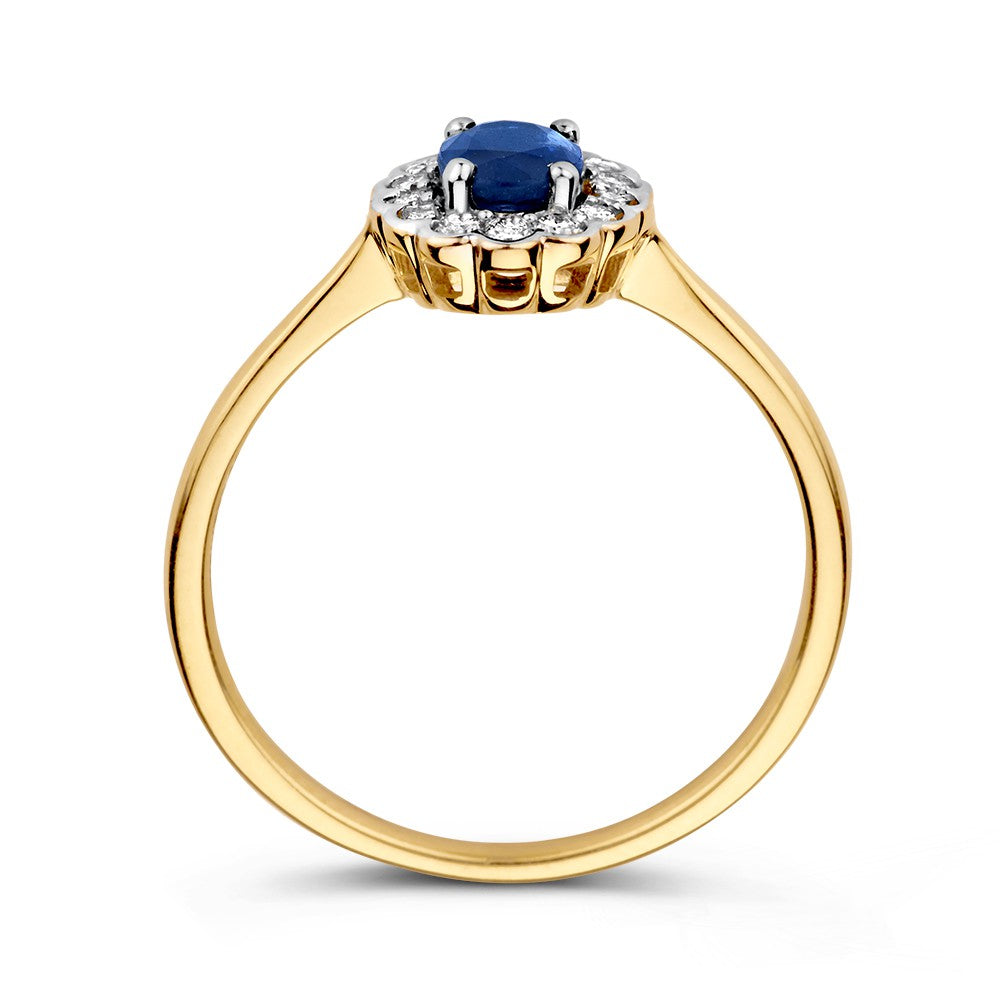 Anillo de oro clásico con zafiro ovalado azul y diamantes de 0.18ct
