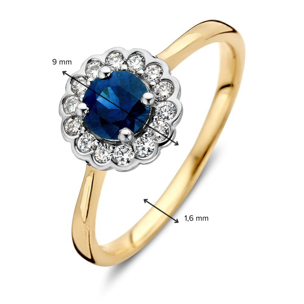 Anillo de oro clásico con zafiro azul redondo y 0.18ct diamantes
