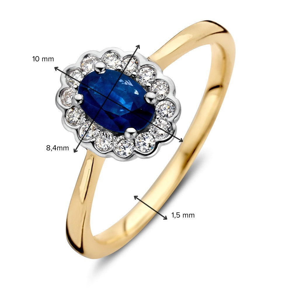 Anillo de oro clásico con zafiro ovalado azul y diamantes de 0.18ct