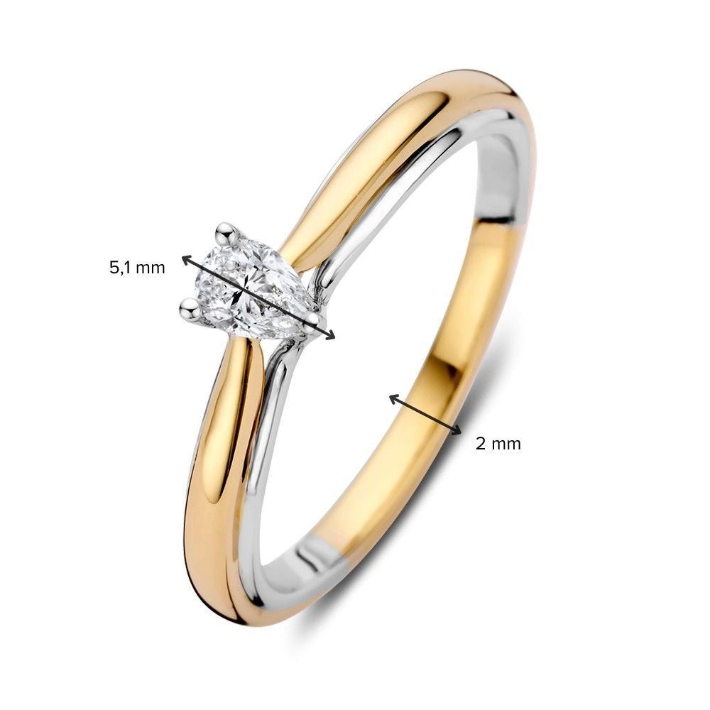 Anillo solitario de oro bicolor con diamante en forma de pera 0.23ct