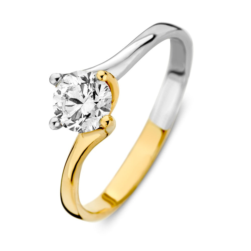 Anillo solitario bicolor de oro blanco y amarillo con circonita, diseño elegante y moderno.