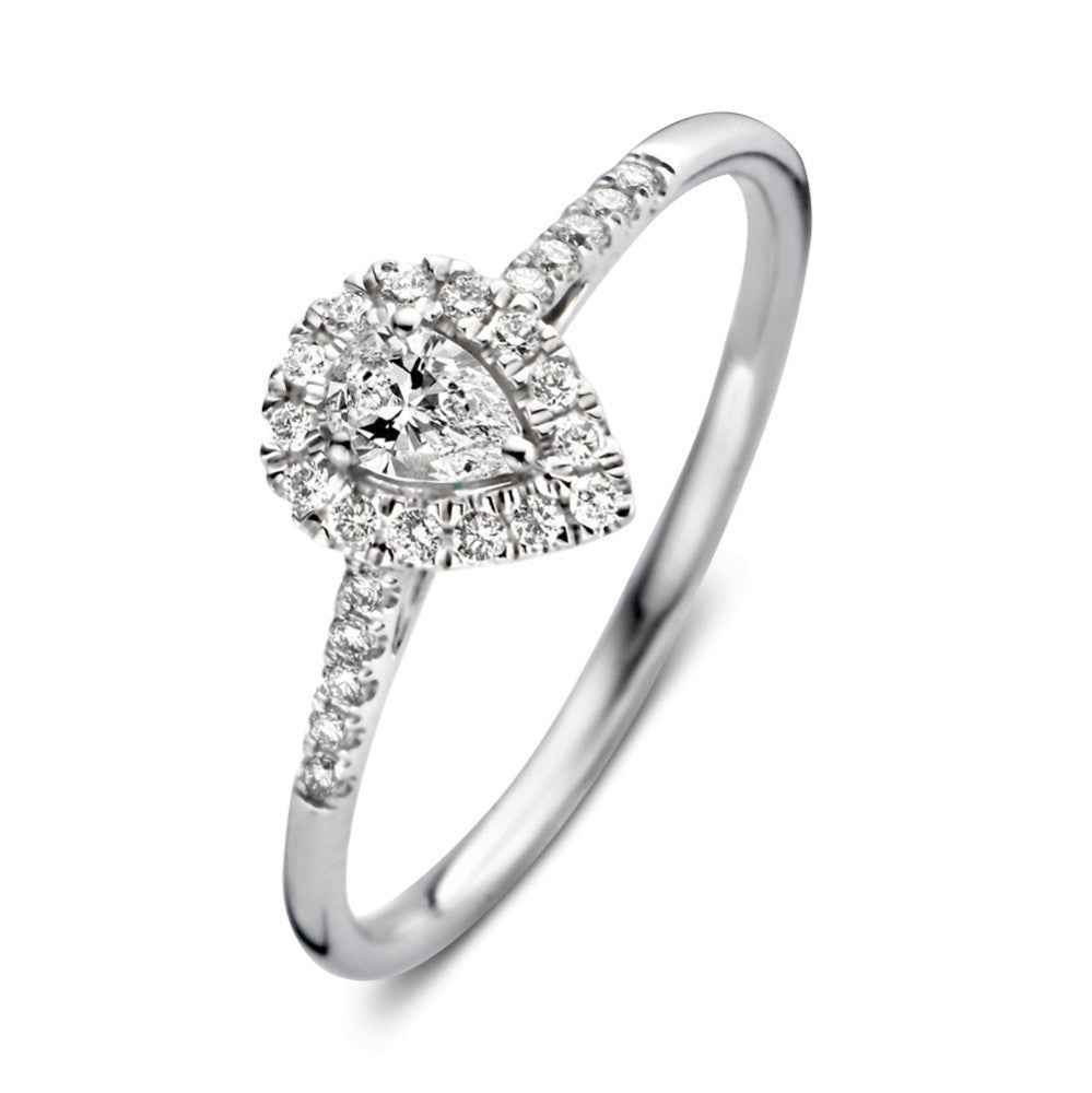 Anillo de oro blanco con forma de gota, adornado con diamantes brillantes.