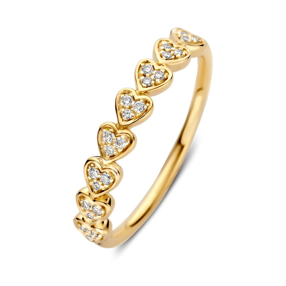Anillo de oro amarillo con brillantes en forma de corazón de 0.10 crt.