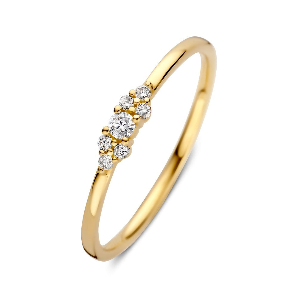 Anillo de oro amarillo con brillantes de 0.10 crt, diseño delicado y brillante.