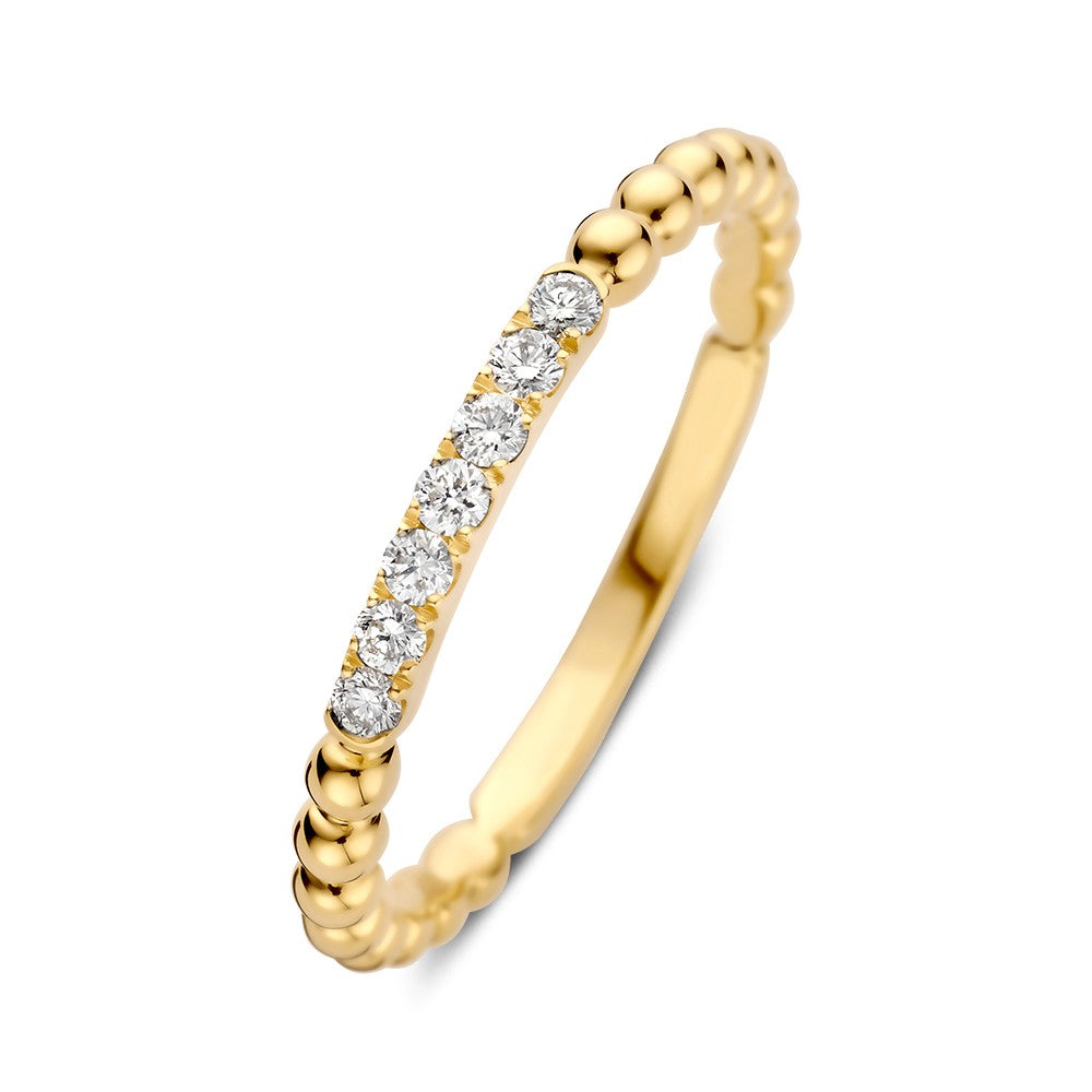 Anillo de oro amarillo con diamantes brillantes de 0,14 crt, diseño delicado y elegante.