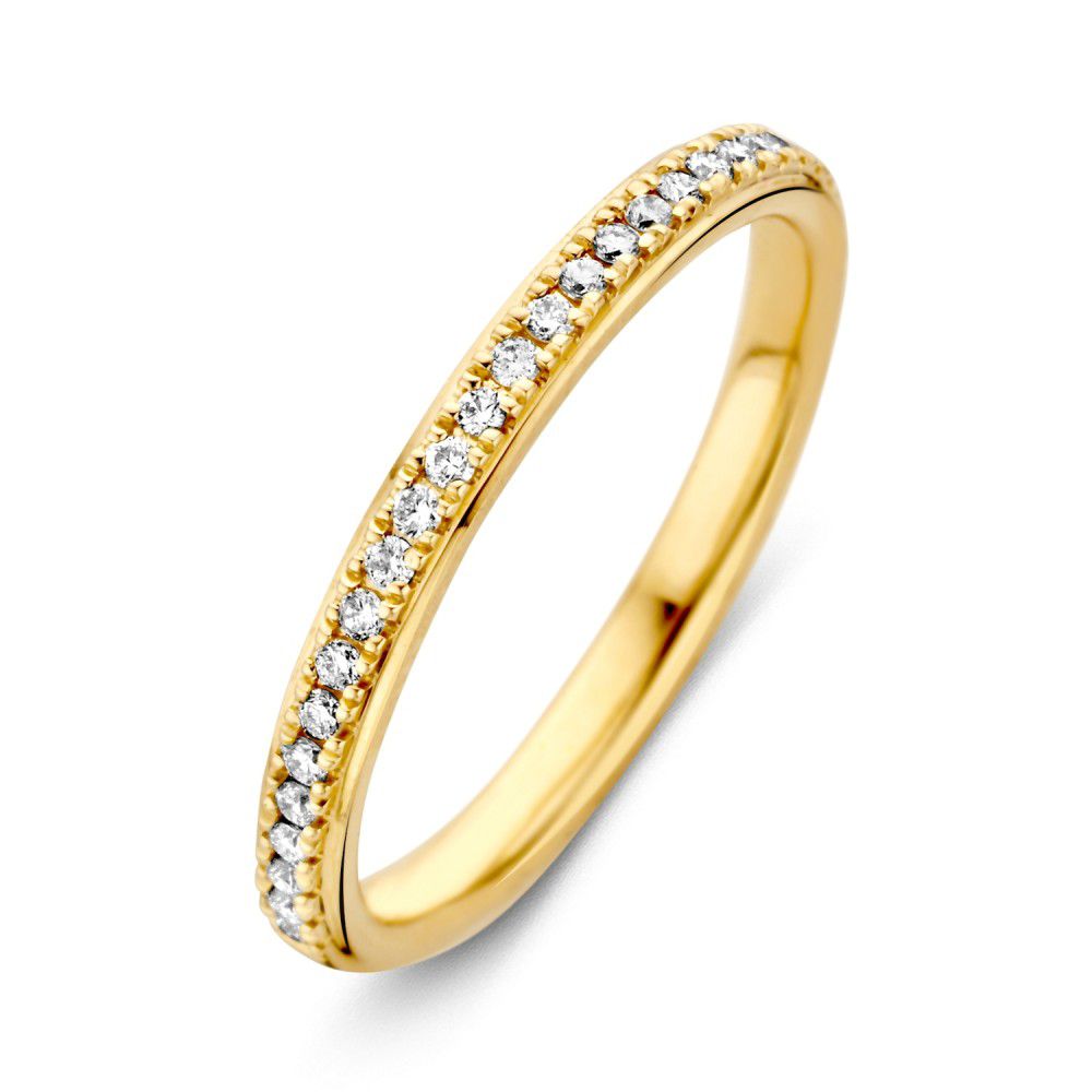 Anillo de dama en oro amarillo de 14 quilates con diamantes brillantes de 0.17 quilates.