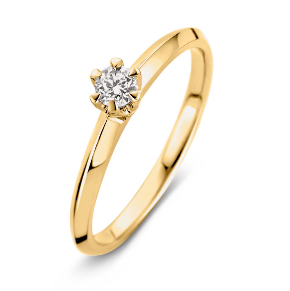 Anillo solitario de oro amarillo con diamante de 0,19 crt en engaste Tiffany.
