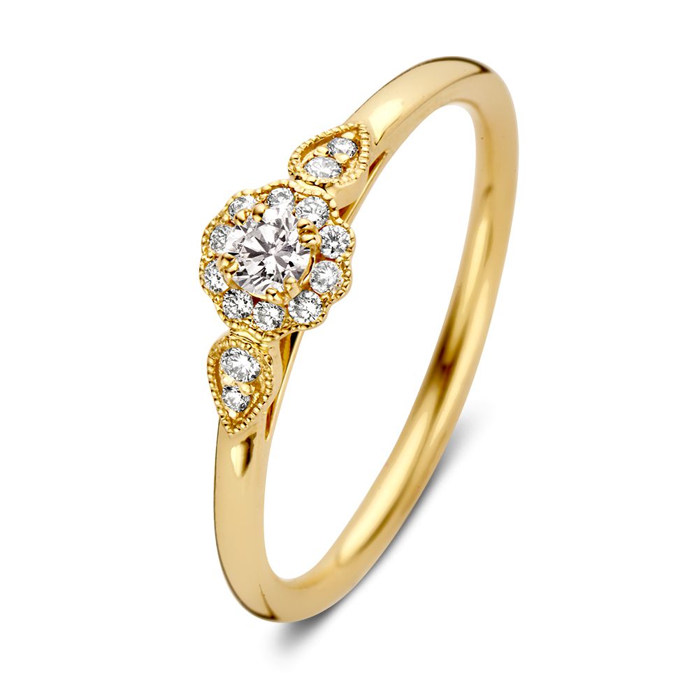 Anillo de oro amarillo con piedra central brillante de 0.21 crt y detalles de diamantes.