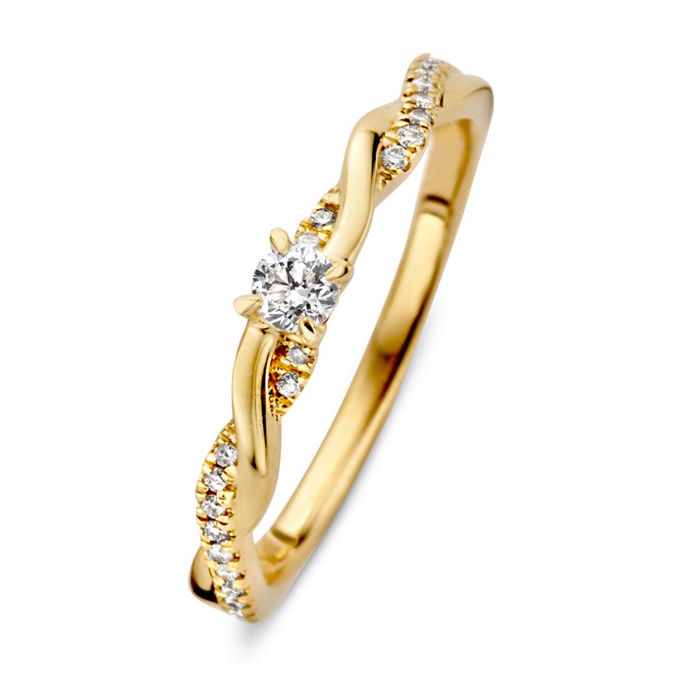 Anillo de oro amarillo con diamante brillante de 0,22 ct y detalles en espiral.
