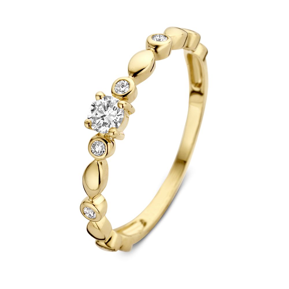 Anillo solitario de oro amarillo con diseño trabajado y diamante de 0.23 crt.