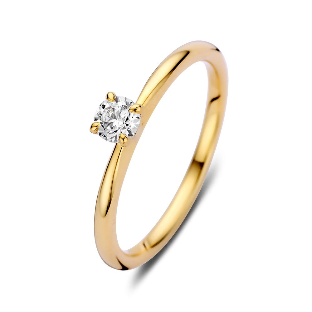 Anillo de oro elegante con un brillante de 0,25 crt en un diseño refinado para damas.