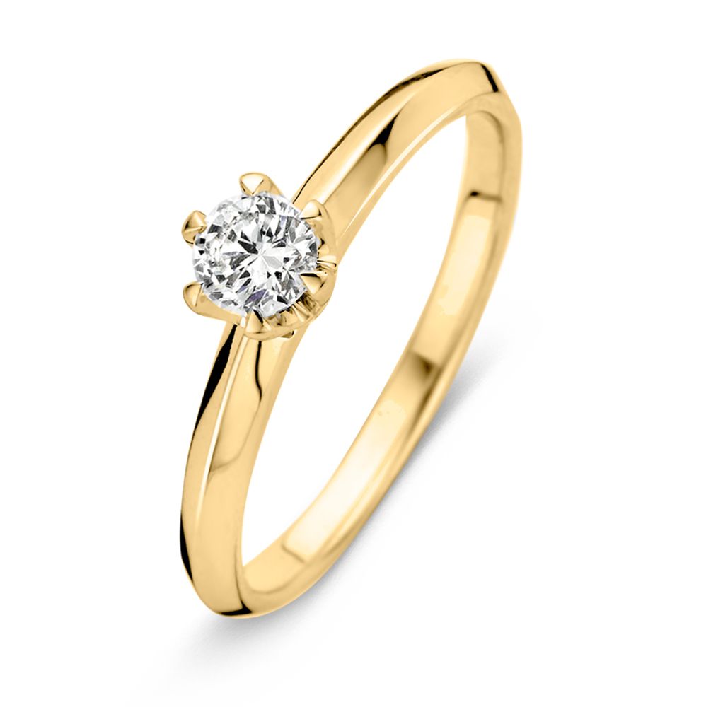 Anillo de oro amarillo de 14 quilates con un diamante de 0.30 ct en engaste Tiffany.