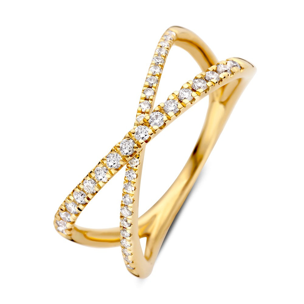 Anillo de oro amarillo con brillantes de 0.30 crt en diseño entrelazado.