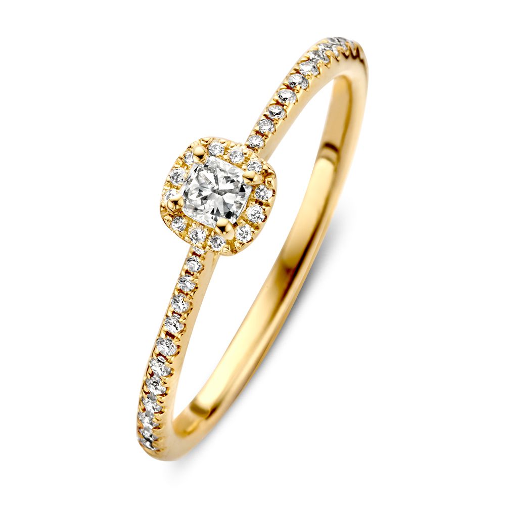Anillo de dama en oro amarillo de 14 quilates con diamante talla princesa y circonitas.