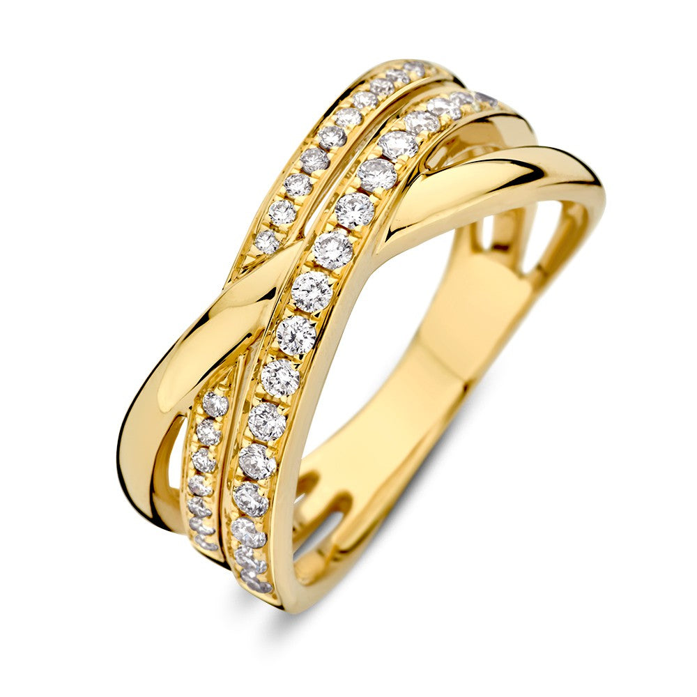 Anillo cruzado de oro amarillo de 14 quilates con diamantes brillantes.