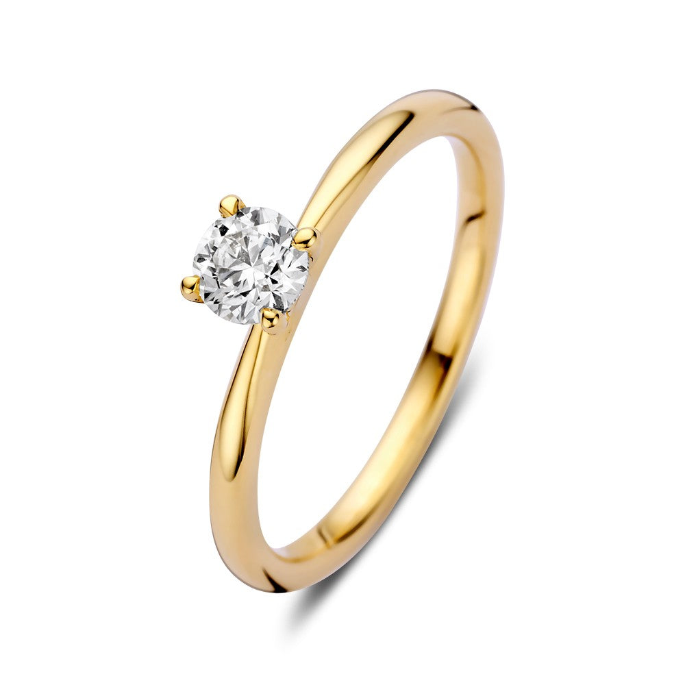 Anillo de oro elegante con un brillante de 0,40 crt, diseño sencillo y lujoso para damas.