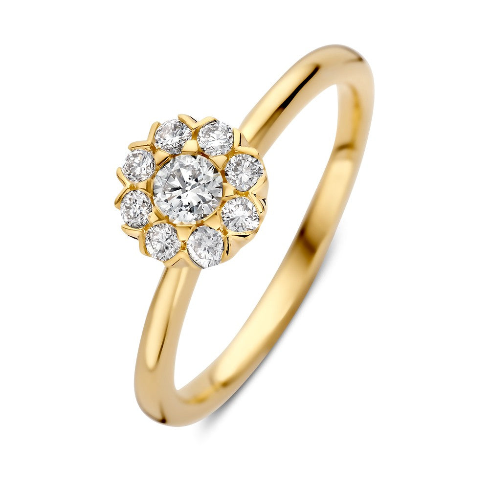 Anillo de oro amarillo con diamantes, diseño floral y un brillante central de 0.41 crt.