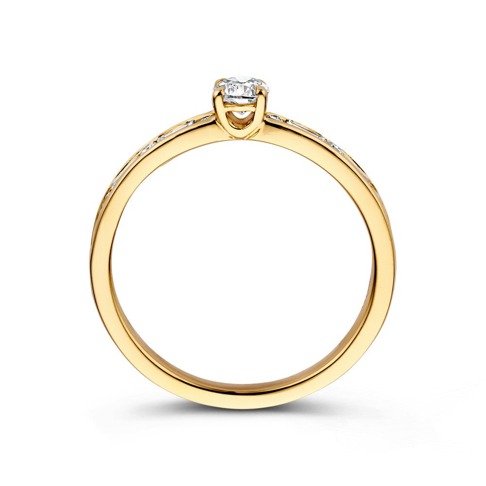 Anillo solitario de oro amarillo con diamantes y tallas baguette y brillante – 14 quilates 0.63 crt.