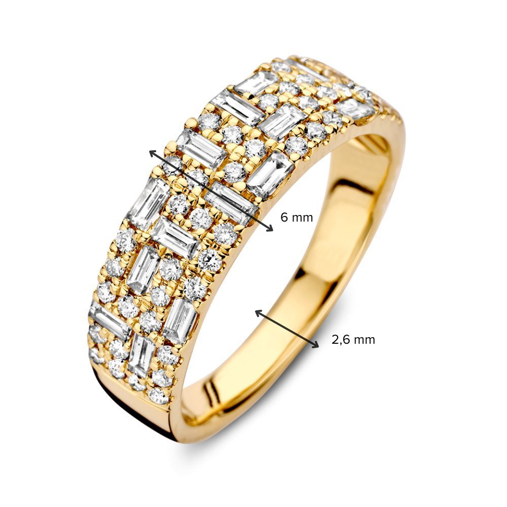 Anillo Elegante de Oro Amarillo con Diamantes Brillantes y Baguette de 0.94 crt.