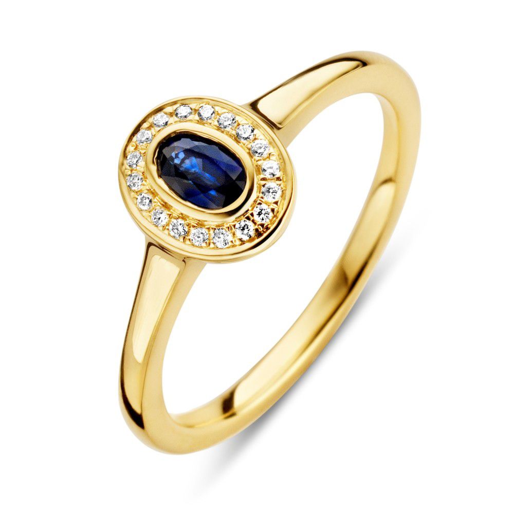Anillo de oro amarillo con zafiro azul y diamantes brillantes en un diseño ovalado.