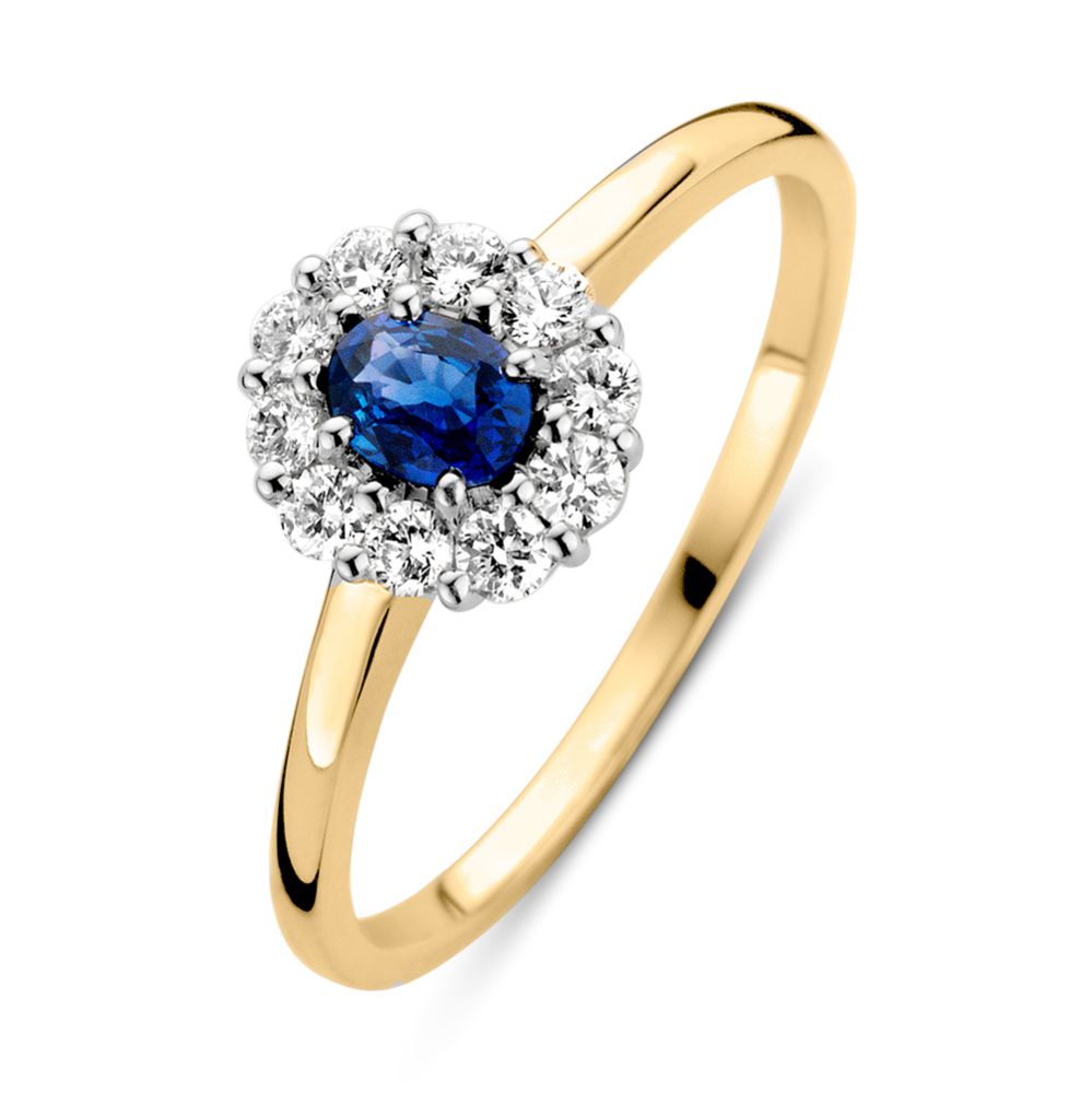 Anillo de oro amarillo refinado con zafiro azul y diamantes brillantes.