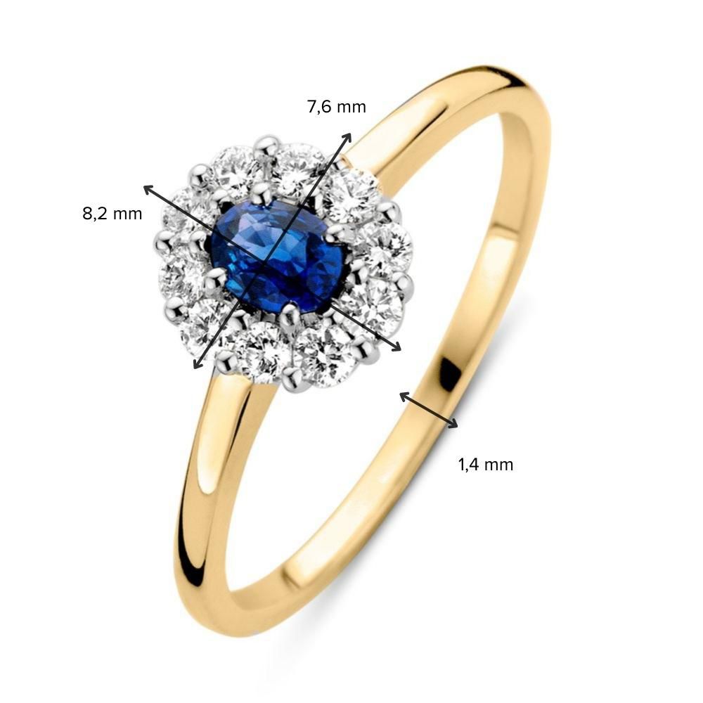 Anillo refinado de oro amarillo con zafiro azul y diamantes brillantes