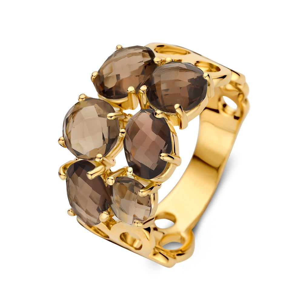 Anillo ancho de oro amarillo con cuarzo ahumado, presenta seis piedras ovaladas en un diseño orgánico.