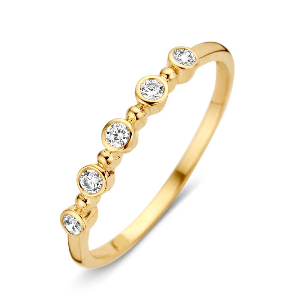Anillo de dama en oro amarillo de 14 quilates con circonitas en engaste sencillo.
