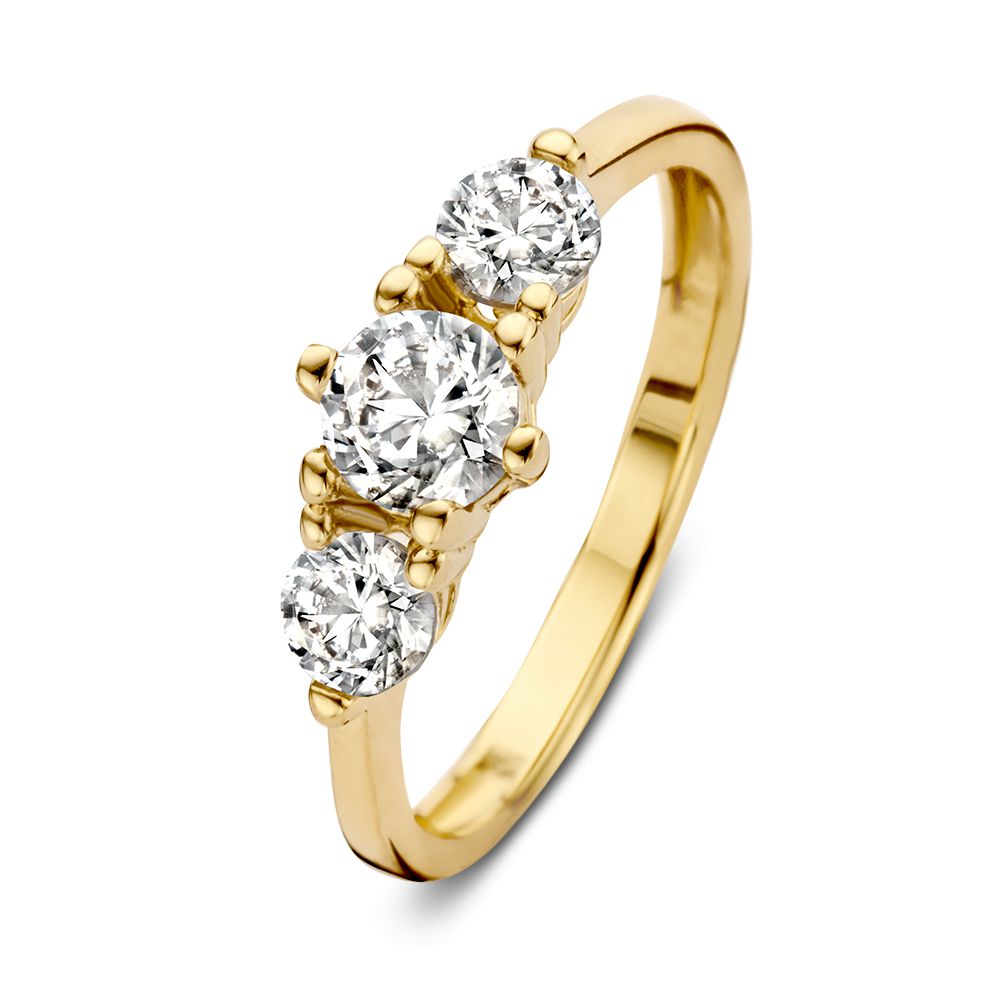 Anillo de dama en oro amarillo de 14 quilates con tres circonitas brillantes.