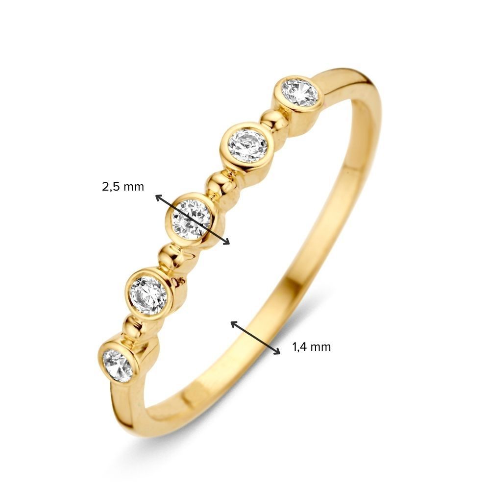 Anillo de mujer sutil en oro amarillo con circonitas en engaste ajustado – 14 quilates de oro