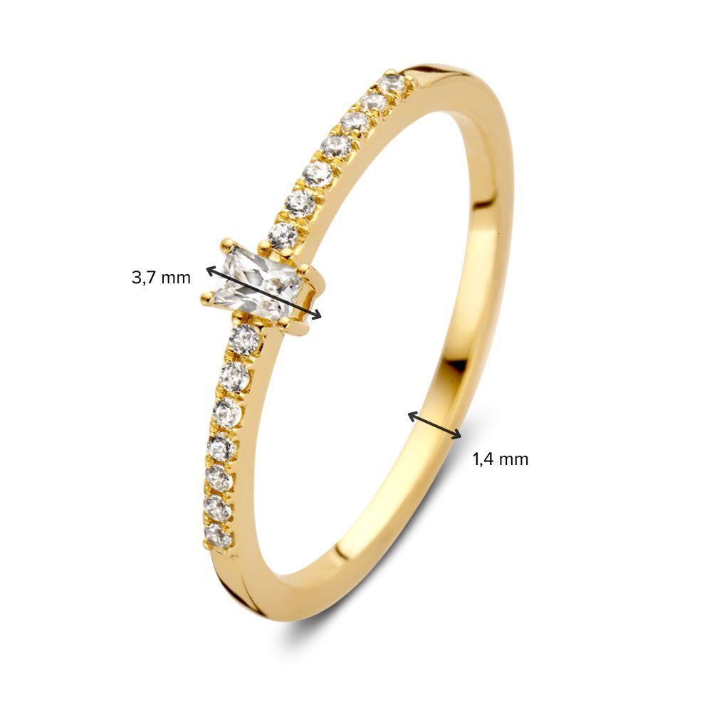 Anillo de oro amarillo con circonitas y piedra central tallada en baguette