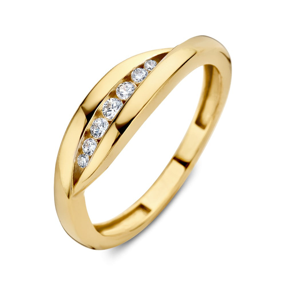 Anillo de oro amarillo con circonitas, diseño elegante y brillante, forma suave y moderna.