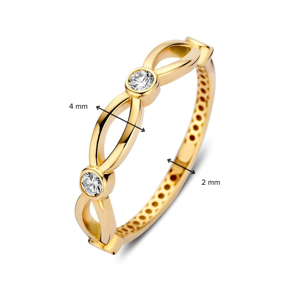 Anillo de oro amarillo con circonitas en diseño juguetón - Sutil y elegante