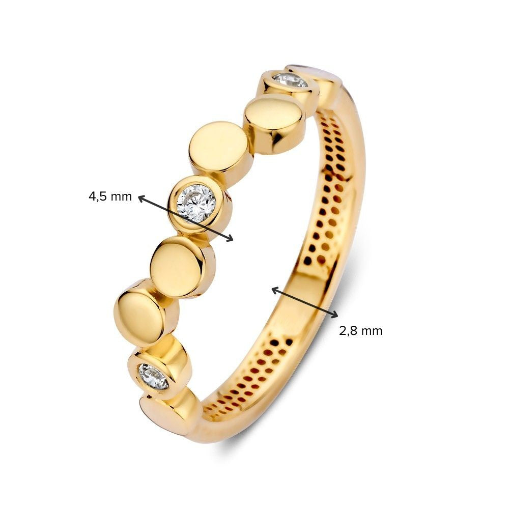 Anillo de oro amarillo con elementos redondos juguetones y brillantes circonitas