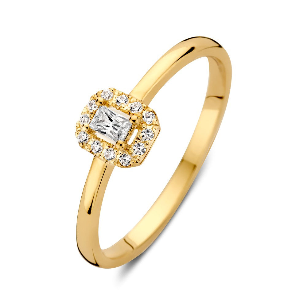 Anillo de oro amarillo elegante con engaste de entourage y circonita esmeralda tallada.