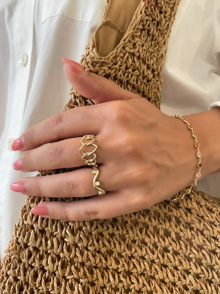 Speelse Geelgouden Ring met Zirkonia's in Ronde Zetkasten – Een Vrolijke Twist voor Elke Look