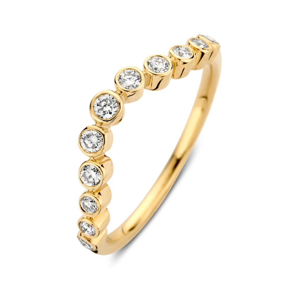 Anillo de oro amarillo con diamantes de 0,26 quilates en forma de ola.