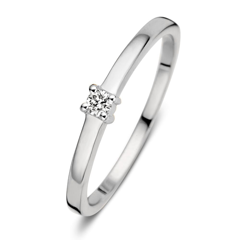 Anillo de oro blanco de 14 quilates con un brillante de 0,06 quilates en el centro.