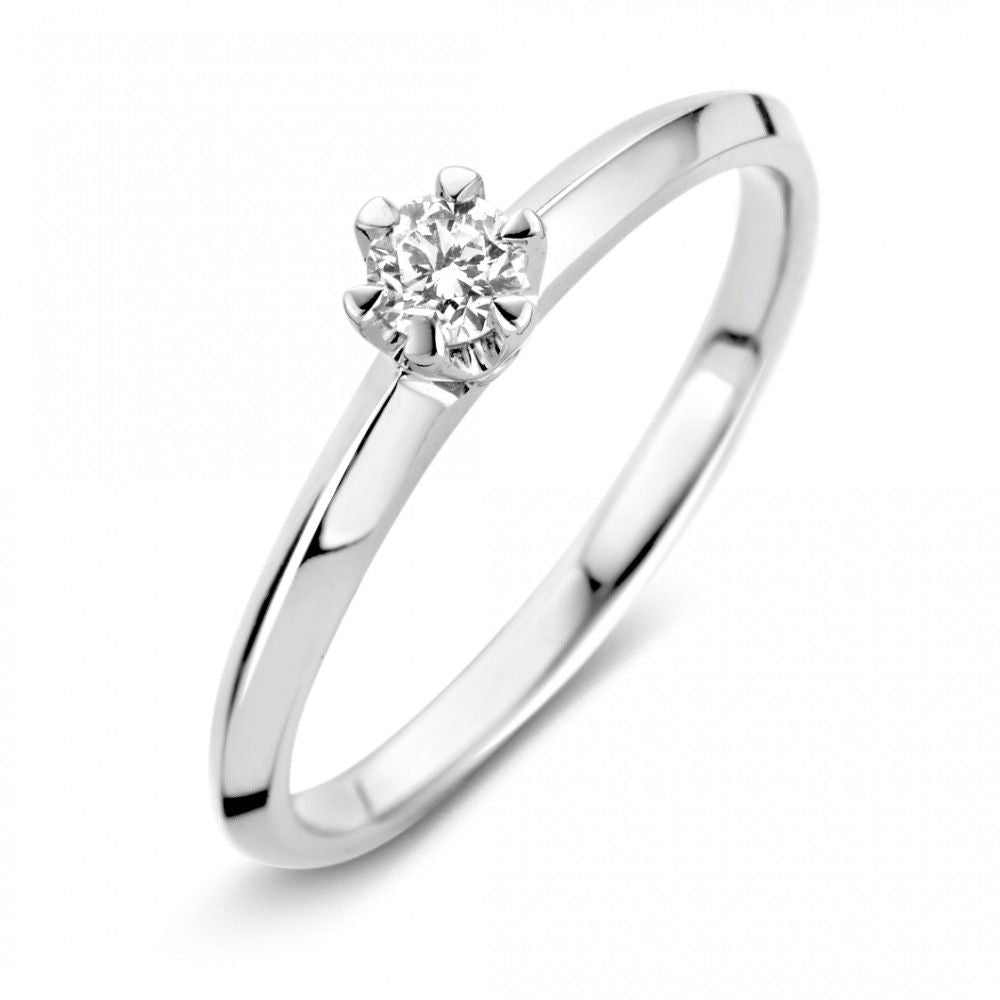 Anillo elegante de oro blanco de 14 quilates con diamante brillante de 0,19 quilates.