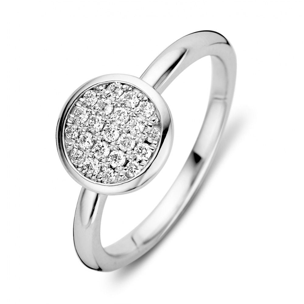 Anillo de oro blanco rodiado con 0,20 quilates de diamantes en engaste pavé.