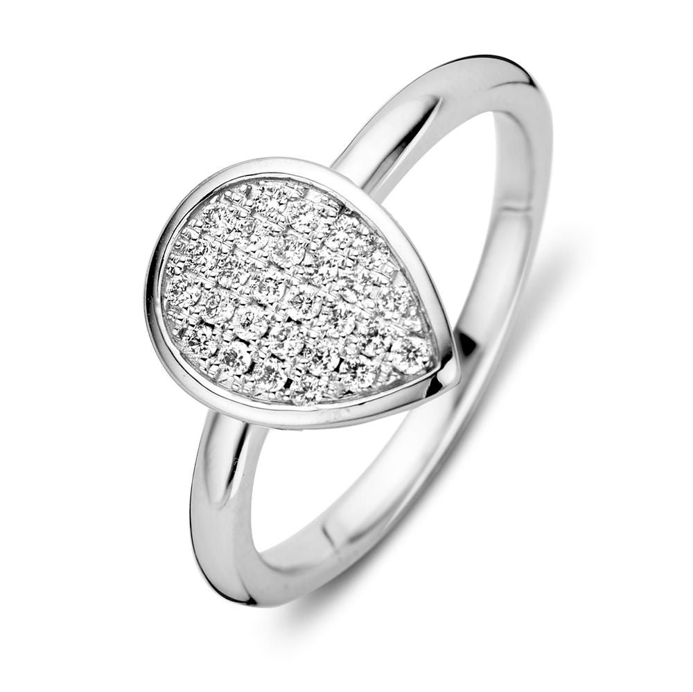 Anillo de dama de oro blanco rodiado con 0,20 quilates de brillante en engaste pavé, forma de gota.