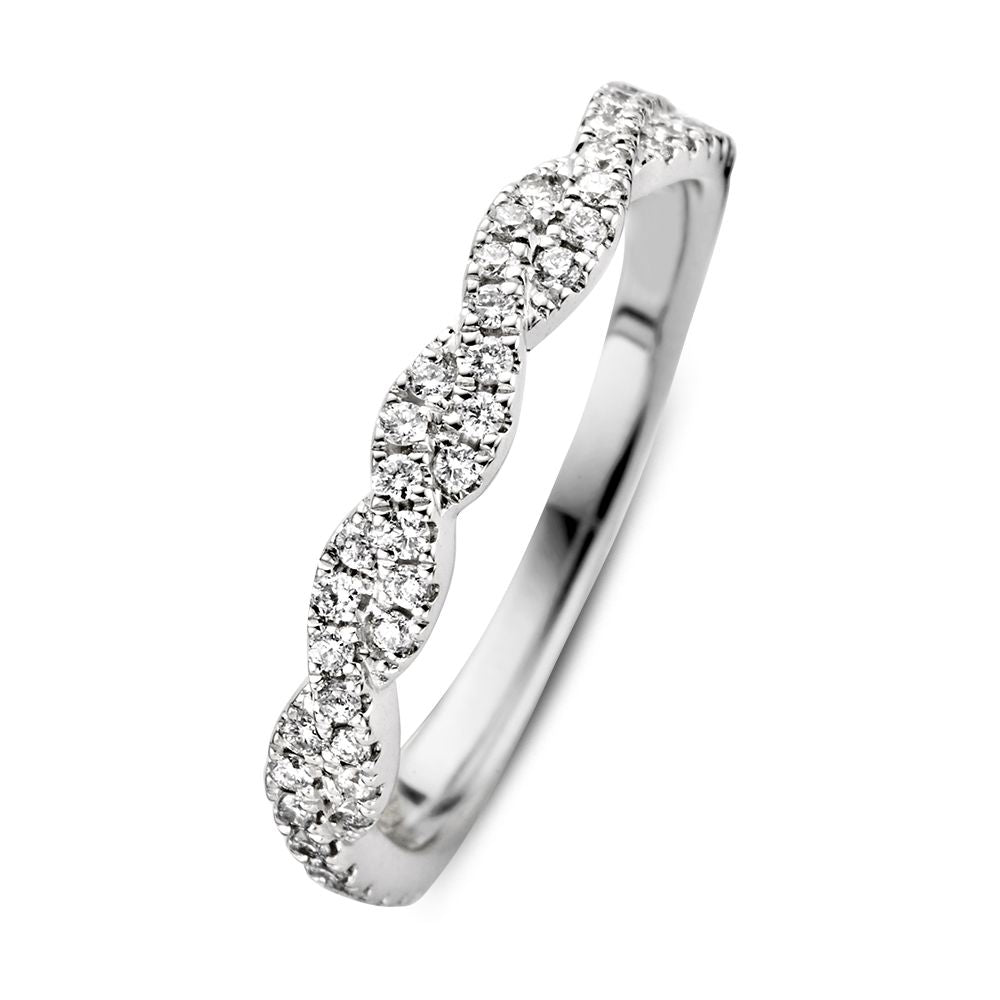Anillo de oro blanco con banda retorcida y diamantes de 0,34 crt.