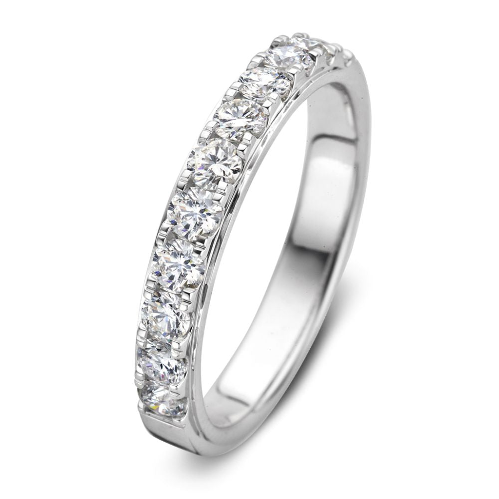 Anillo de oro blanco con diamantes brillantes en engaste chatón, 0.76 quilates.
