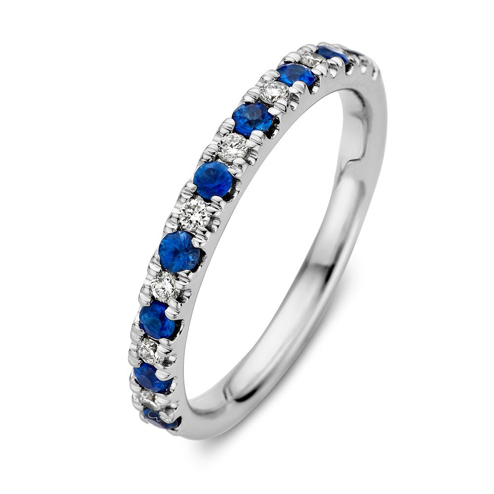 Anillo de oro blanco de 14 quilates con zafiros azules y diamantes de 0,14 quilates.