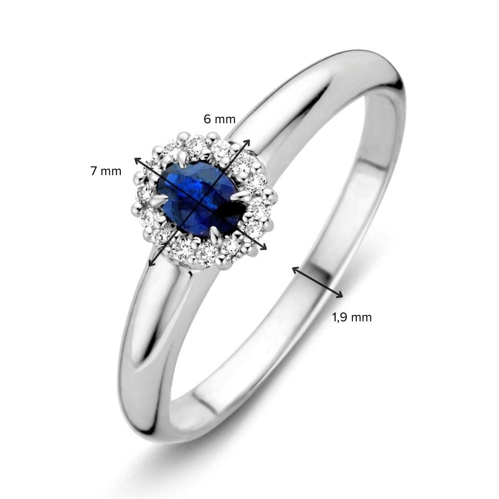 Anillo de mujer de oro blanco con diamante y zafiro azul – Elegante y Refinado