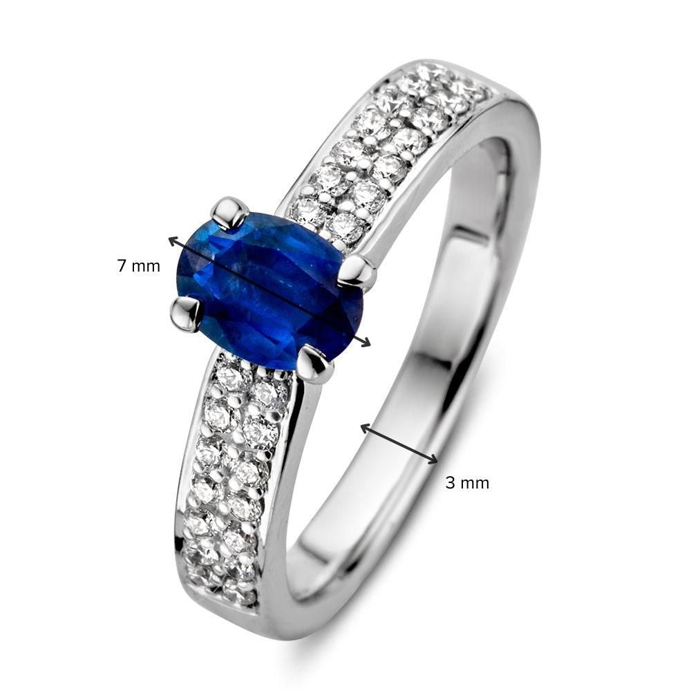 Anillo de oro blanco con zafiro azul y diamantes