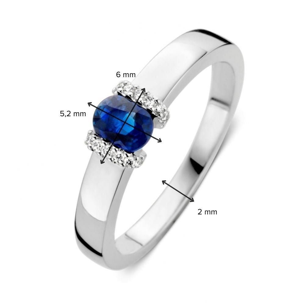 Anillo de oro blanco con zafiro azul y diamante: Elegante y Atemporal