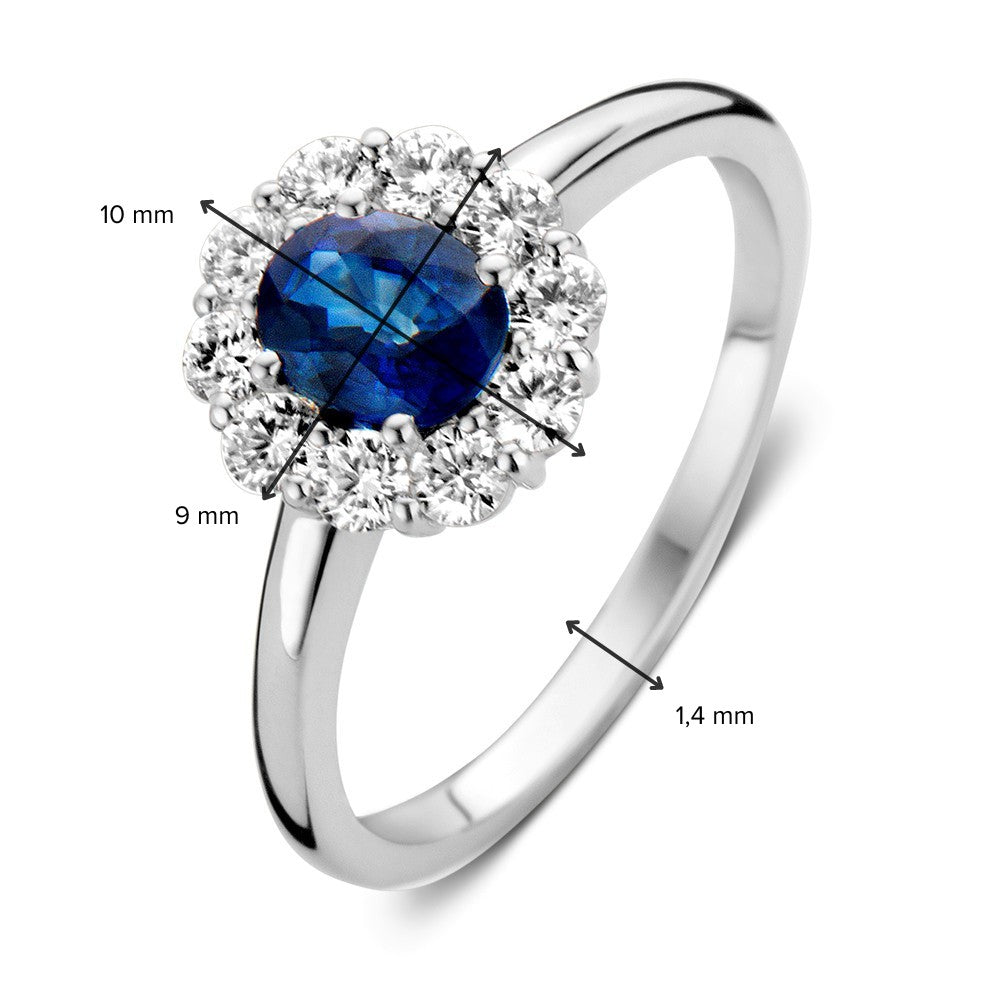 Anillo de oro blanco con zafiro azul y diamantes - Elegancia atemporal en un entorno clásico