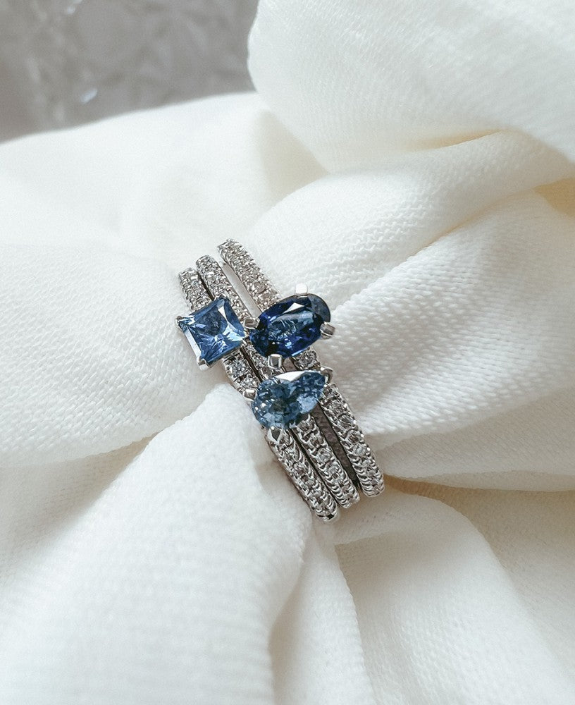 Anillo de oro blanco con brillante y zafiro